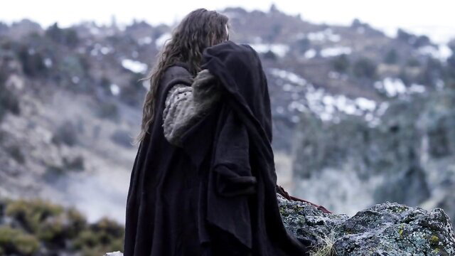 Elena Koshka petite brunette in cloak on snowy outdoor cliff