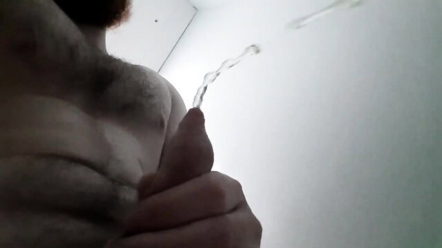 Bearded dad hairy chest closeup urinating thick cumshot stream