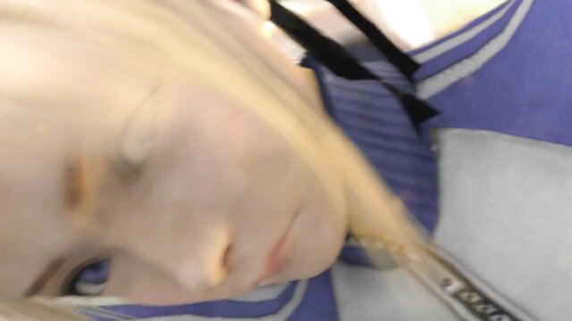 Blonde Tina Armstrong in tight wrestling outfit, neck grabbed, zombie gangbang tease