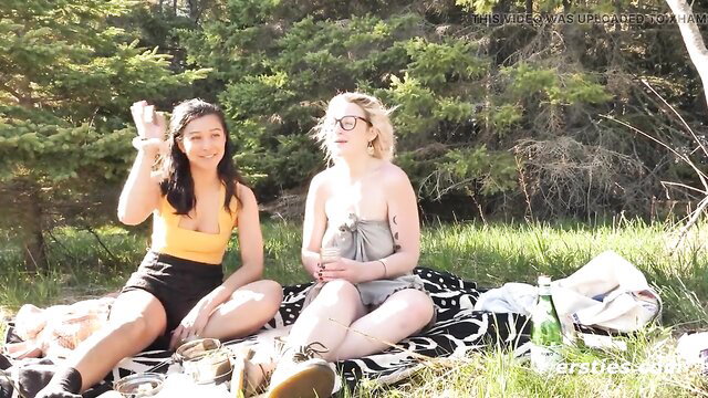 Hanna & Jin in skimpy tops on picnic blanket outdoors Ersties