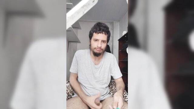 Latino XXL stud with beard grabs huge cock, ready to jizz