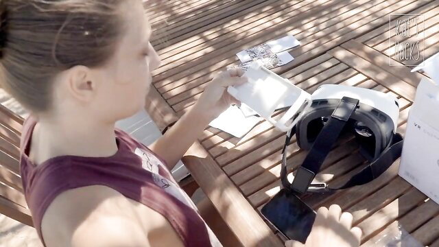 Brunette teen flashing tits and pussy outdoors on deck with VR headset