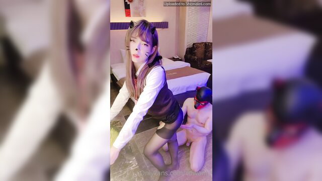 CDwant2 catgirl in stockings kneels over masked man in BDSM scene