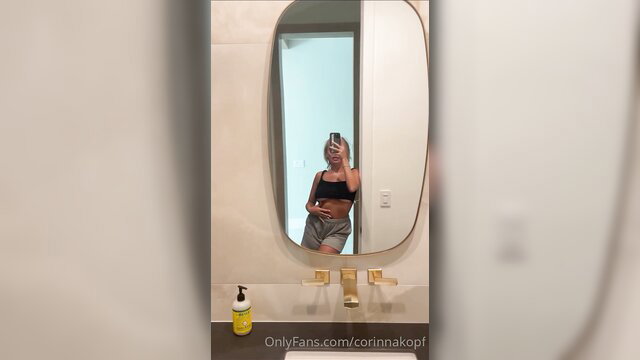 Corinna Kopf hot topless mirror selfie in gray shorts OnlyFans