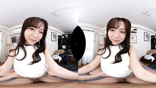 Japanese AV idol in white tank top spreads legs wide in VR POV solo tease