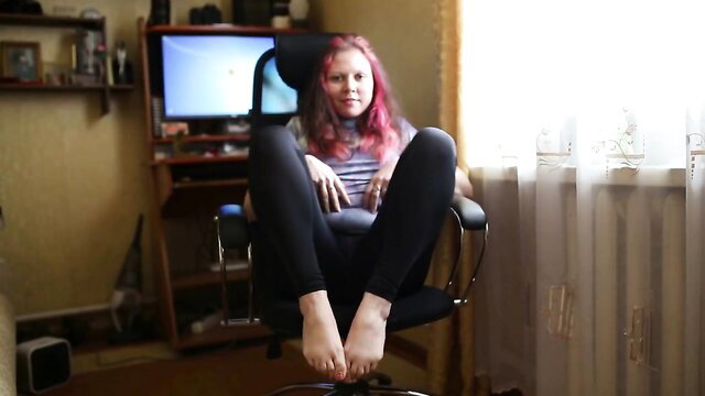 Pink hair girl barefoot in chair tugs cock with feet and hands closeup