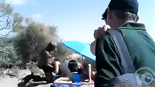Mature amateur slut fucked outdoors at beach under umbrella