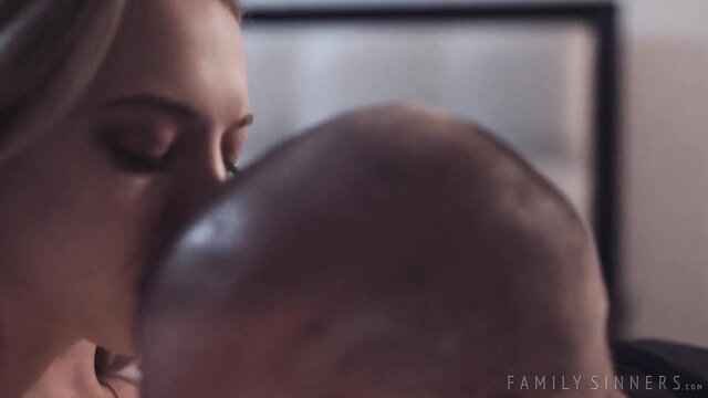 Lily Larimar blonde teen kisses man close-up in steamy scene