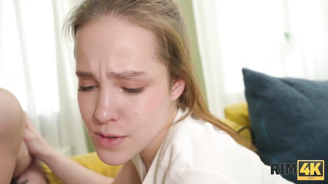 Blonde teen with teary eyes touched intimately by man in steamy threesome