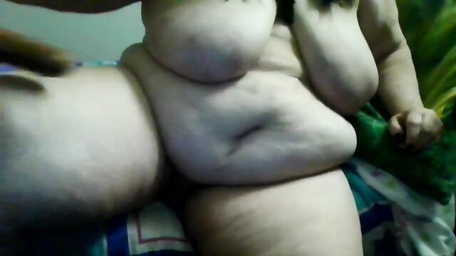 Nude obese white woman spreading thick thighs on bed in lesbian thumbnail