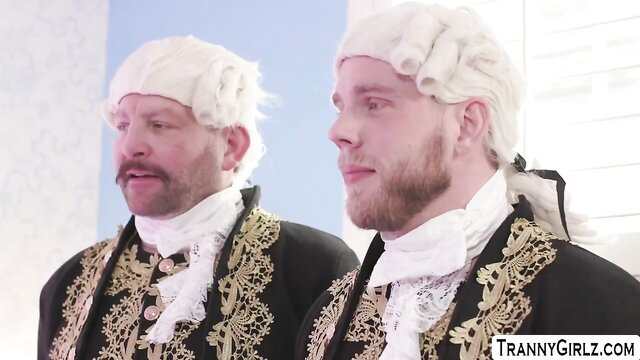 Royal TS Angellica and Brittney in ornate wigs and suits anal play