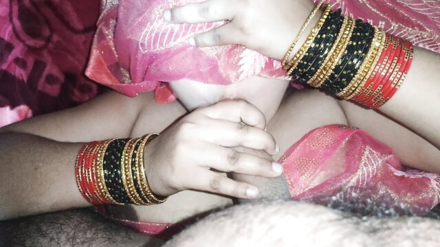 Indian Bhabhi hands with colorful bangles in sheer saree cleavage tease