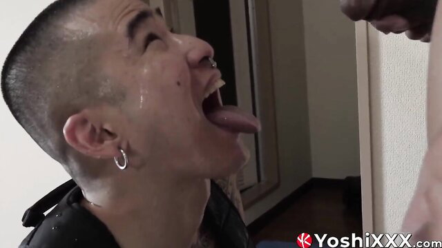 Asian twink bottom sticking out tongue for stud's cock closeup