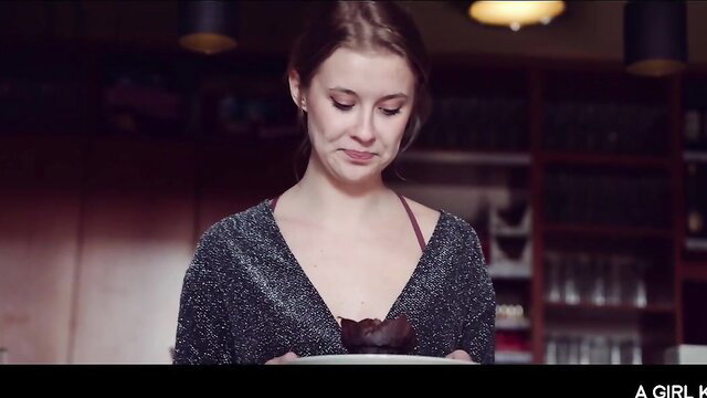 Emylia Argan in sparkly low-cut top holding cupcake, sexy Czech babe