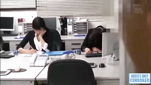 Exhausted Japanese office ladies slumped over desks in forced JAV scene