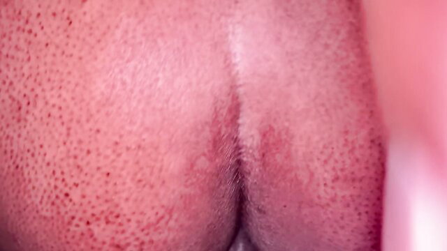 Closeup of black man's muscular ass in back shots porn thumbnail