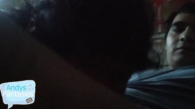 Latino guy in dimly lit room with Andys Fantasies watermark
