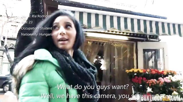 Hungarian student Ria Rodrigez in green parka asks what guys want