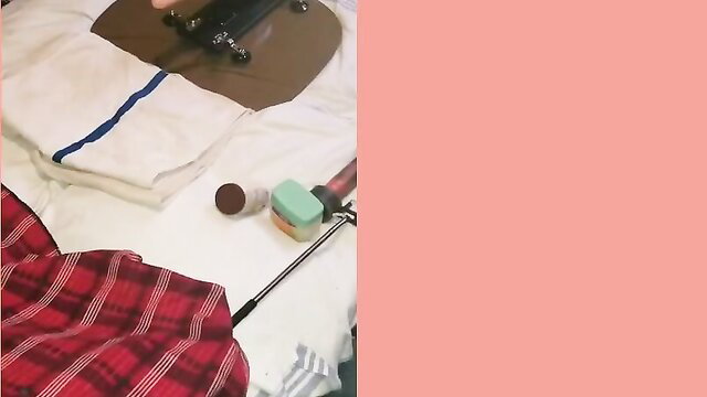 Woman testing free sex machine trial, nude riding dildo on bed