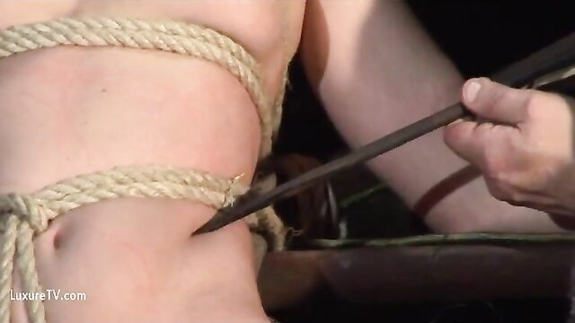 Innocent blonde maid bound in ropes, tortured by master