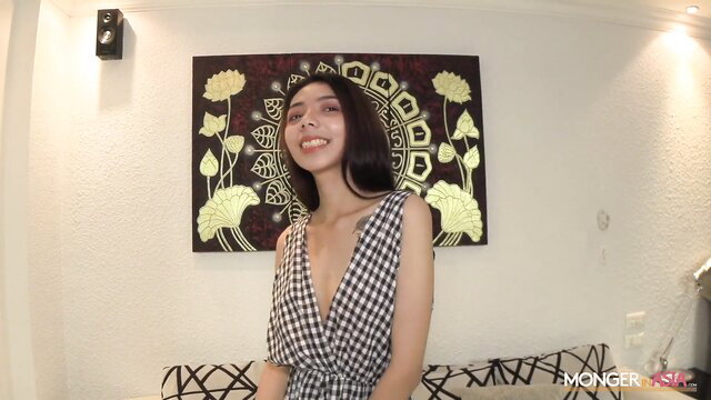 Mungming smiling in checkered wrap dress, Corked Creampies thumbnail