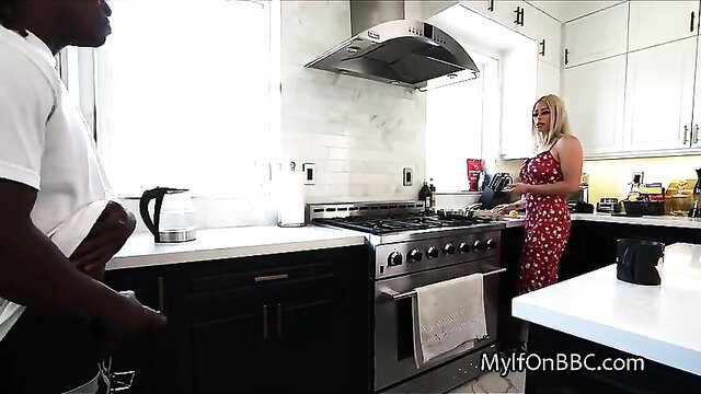 Big Tit Blonde MILF in red dress with black guy in kitchen