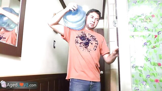 Delivery boy holds blue bucket over head in granny fuck preview by AgedLove