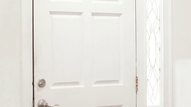 Keira Croft at white door in stockings, sexy adult preview