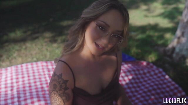 Remy LaCroix in sexy lingerie on picnic blanket outdoors