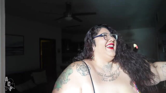 Crystal Blue smiling busty Mexican BBW with tattoos in lingerie