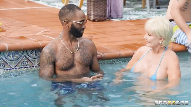 Seka Black in skimpy bikini at pool party with black stud - Brazzers GILF