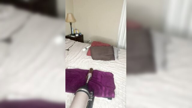 Sexy black babe rides fuckmachine on bed, oral tease