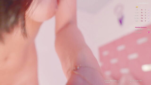 Nicolle Mitchelle closeup arm and pink nails in softcore tease
