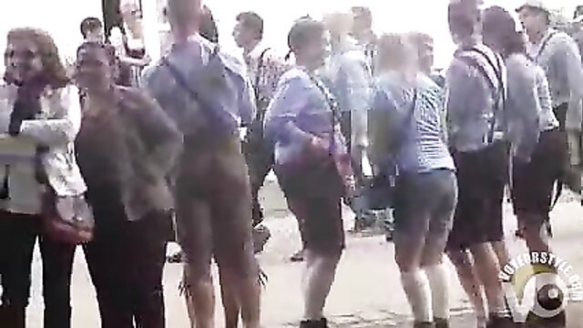 Oktoberfest girls desperate to pee in long toilet line