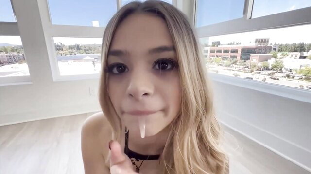 Blonde teen struggles to suck big black cock closeup