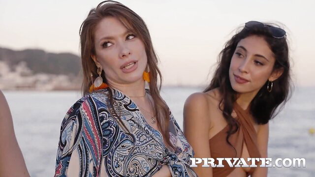 Hot brunette and latina models in bikinis on beach, teasing poses