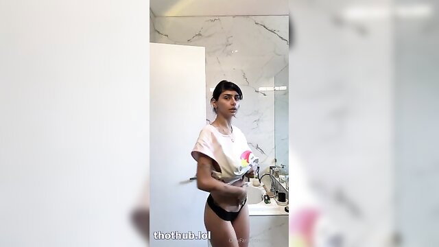 Mia Khalifa hot pink crop top and thong in steamy shower