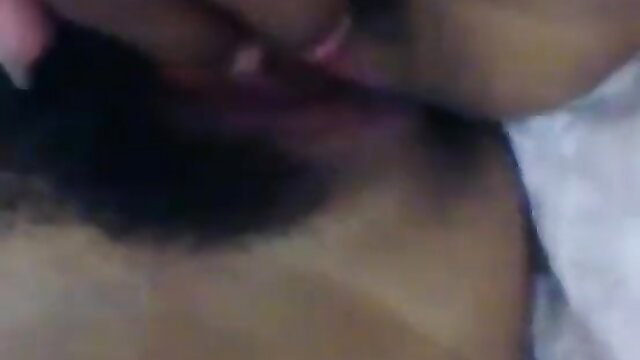 Closeup of black couple kissing passionately in amateur sex scene