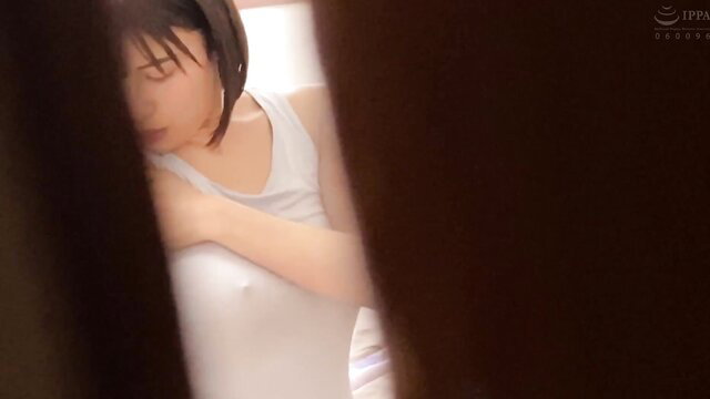 Asian JAV girl in thin tank top, sheer nipples visible, sleepy pose