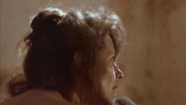Charlotte Rampling profile closeup in Hammers Over the Anvil (1993)