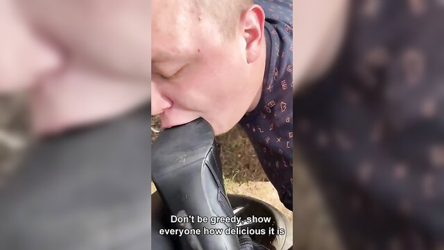 Man greedily licks black boot in foot domination worship teaser