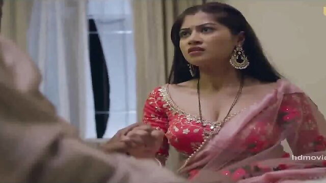 Indian busty babe in red saree with deep cleavage, angry expression