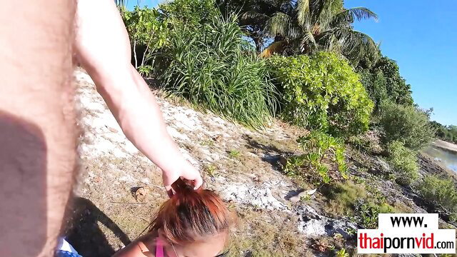 Thai teen redhead sucks big cock outdoor beach POV