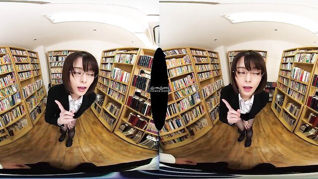 Catalina Luis glasses brunette in library pointing seductively