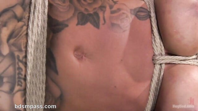 Tattooed alluring slave chick in painful wild suspension bondage punishment