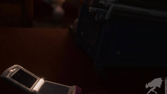 Flipped open flip phone on table in dim lit adult video thumbnail