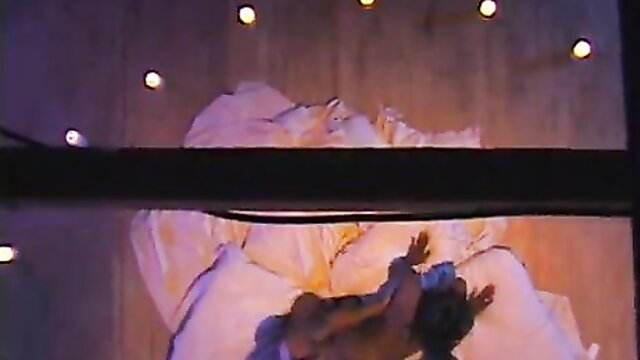 Ebony babe fucked hard in anal on bed in dim lights