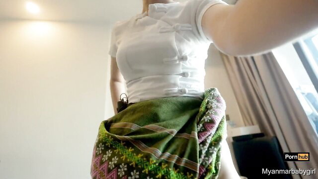 Myanmar teacher in white blouse & green longyi skirt, sexy pose