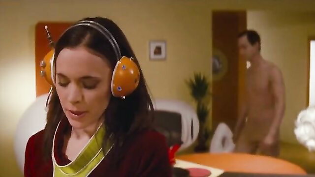 Lucy Egerton topless with headphones in nude scene from Human Assembly