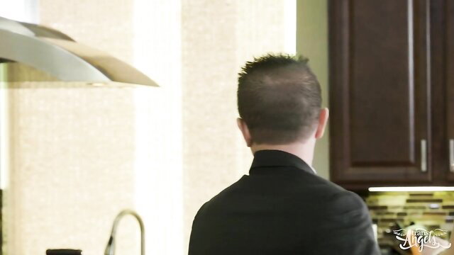 Man in suit at kitchen sink in Kimberlee's Dinner Party Passion